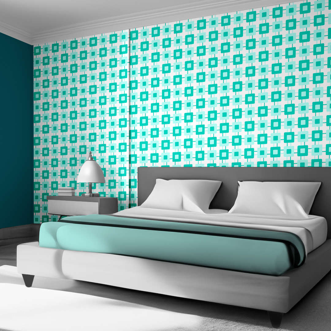 The artwork features a repeating geometric pattern of symmetrical shapes resembling elongated, curved diamonds or petals in various shades of blue and green. Each shape is split vertically with one half filled with a light blue and the other half filled with green or darker blue. The background is a light, almost pastel blue, which provides a soft yet vibrant backdrop. One of the blue shapes near the upper left contains a white starburst element, adding a focal point of brightness to the composition. The overall design conveys a modern, mid-century aesthetic with clean lines and harmonious color contrasts.